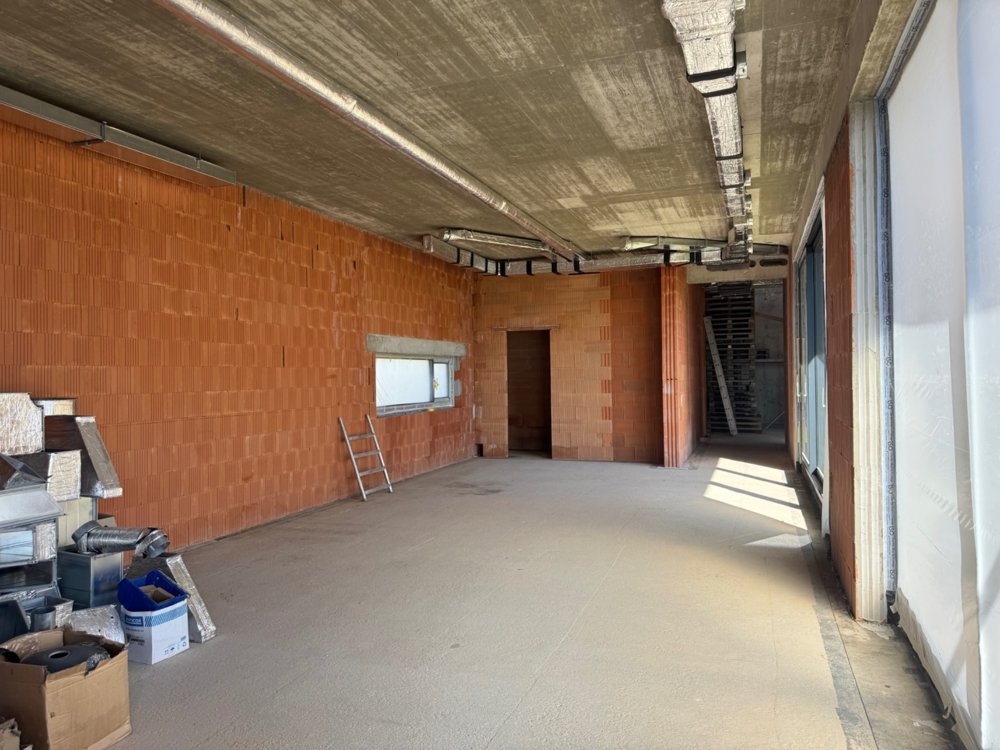 Wohnzimmer — Aktuelles Foto · Bauzustand
